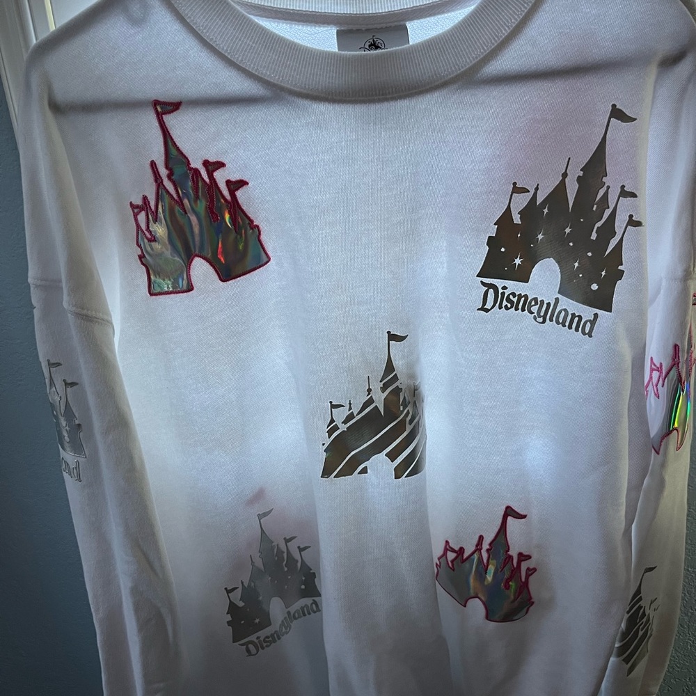 NWOT Disneyland white pullover with silver castle appliqués